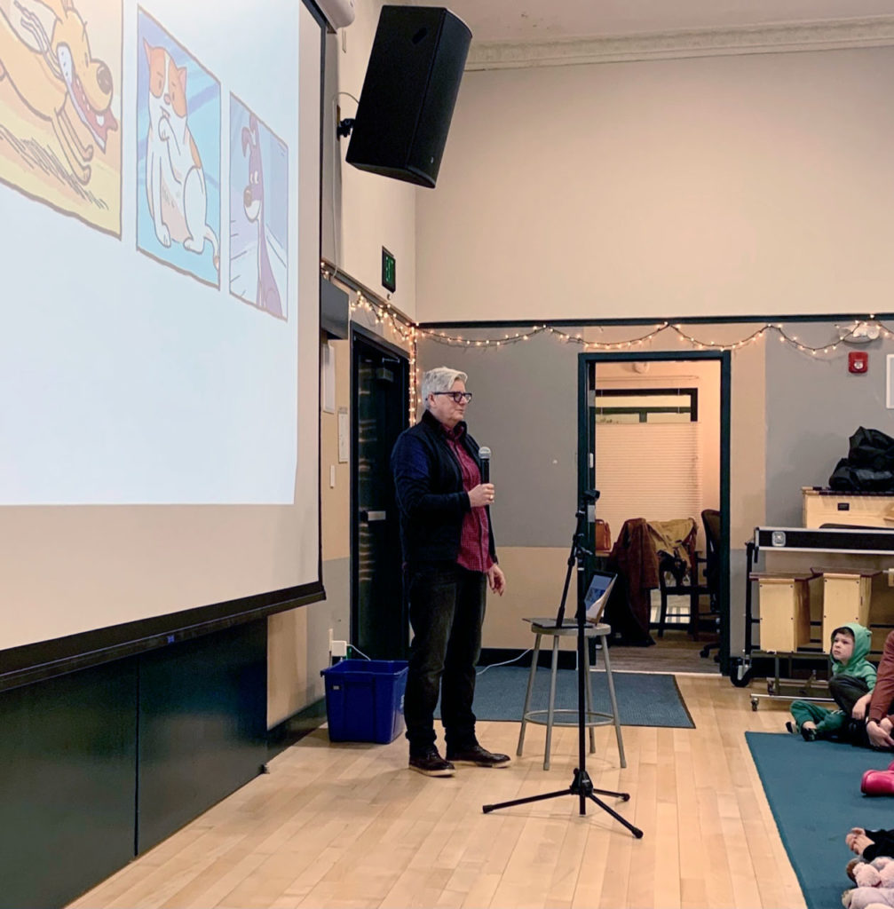 Cartoonist Paige Braddock addresses Synergy School students in San Francisco.